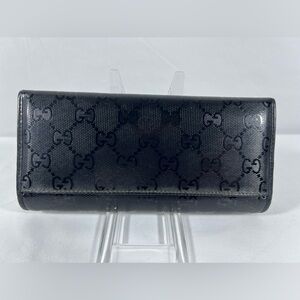 1142: Gucci Black Guccissima Micro GG Glazed Long Wallet